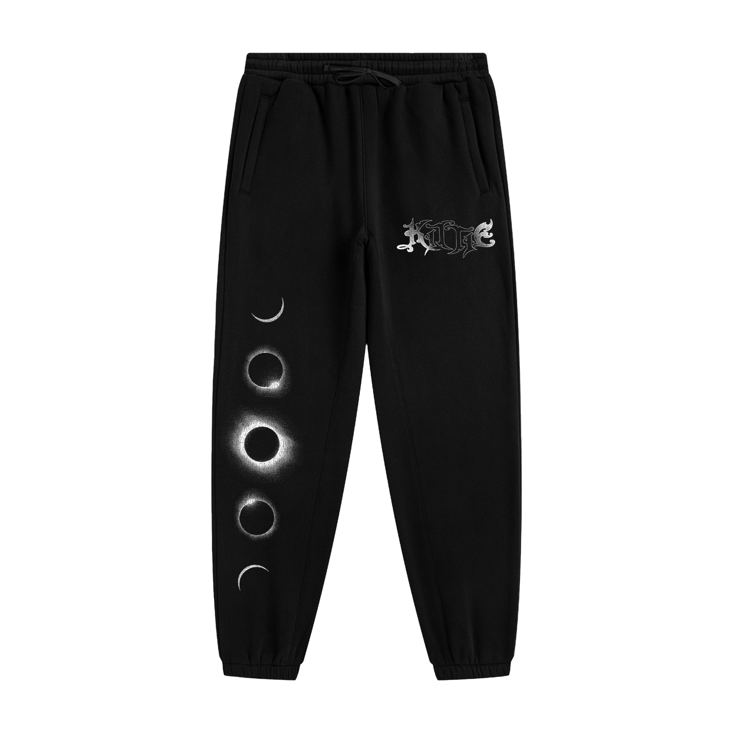 Kittie’s Hecate Black Sweatpants feature a relaxed fit, drawstring waist, white gothic logo on one leg, vertical moon phases on the other, and are crafted from cozy recycled polyester fleece.